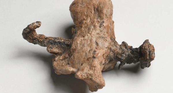 Excavated ankle bone of a crucified person, shows the bent nail through the bone